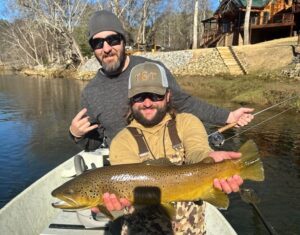 Guide Austin McDonald with a trophy sized brown caught by Ryan on a Toccoa Float